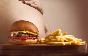 Overgewicht hamburger friet